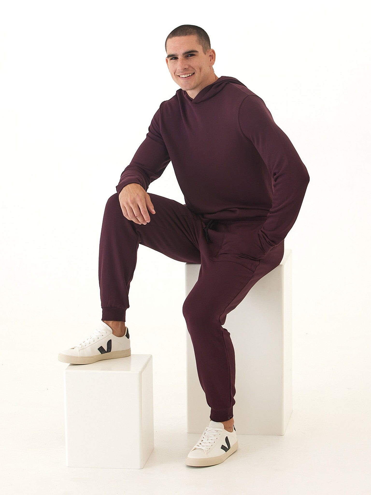 Men's Core Feather Fleece Jogger in deep burgundy wine color with a tapered athletic fit