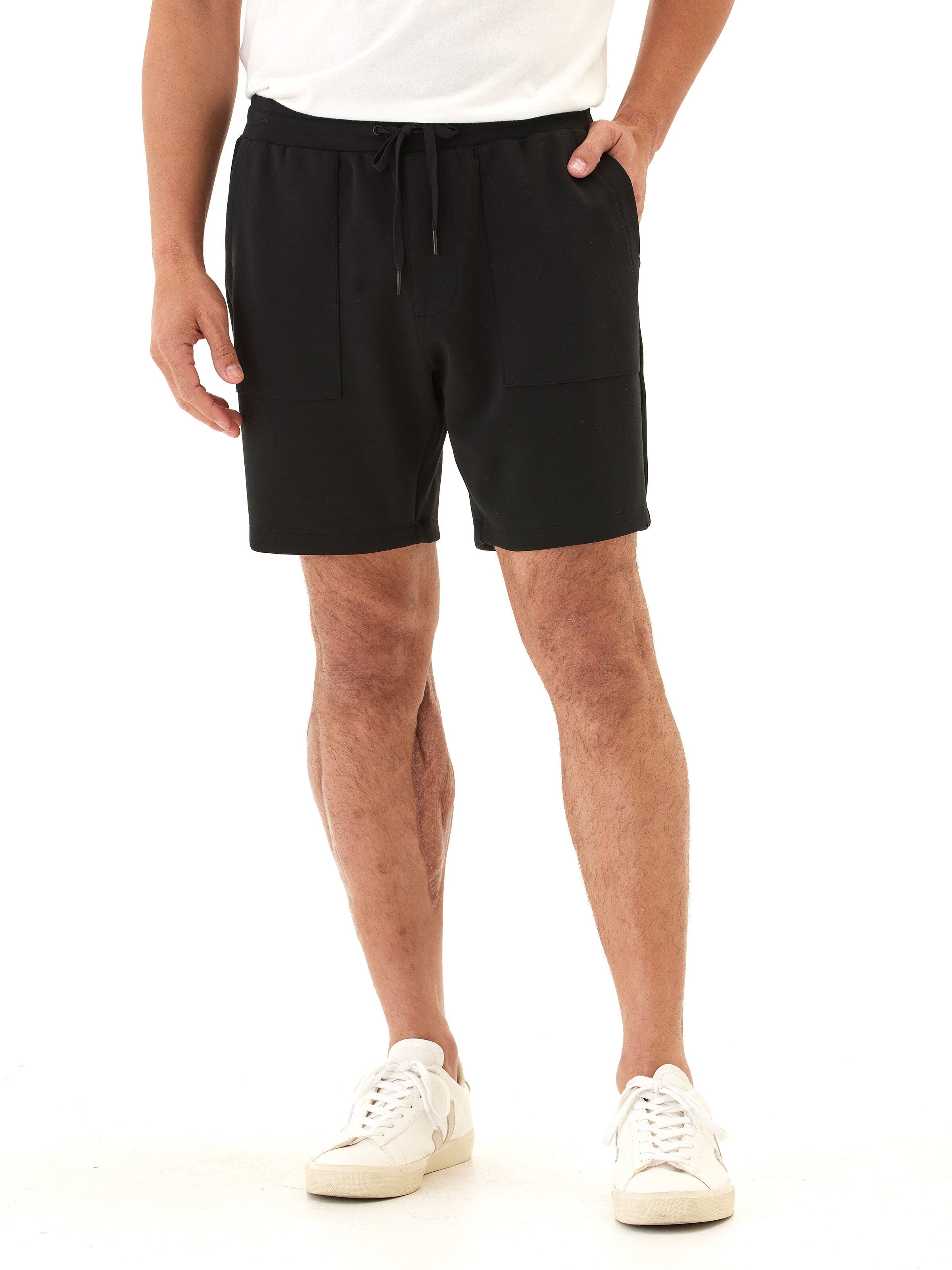 Men wearing Casper Sueded Modal Short in solid black, featuring a relaxed fit and pull-on closure.