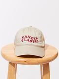 Cancel Plastic Dad Hat in beige with maroon wave embroidery and adjustable strap closure