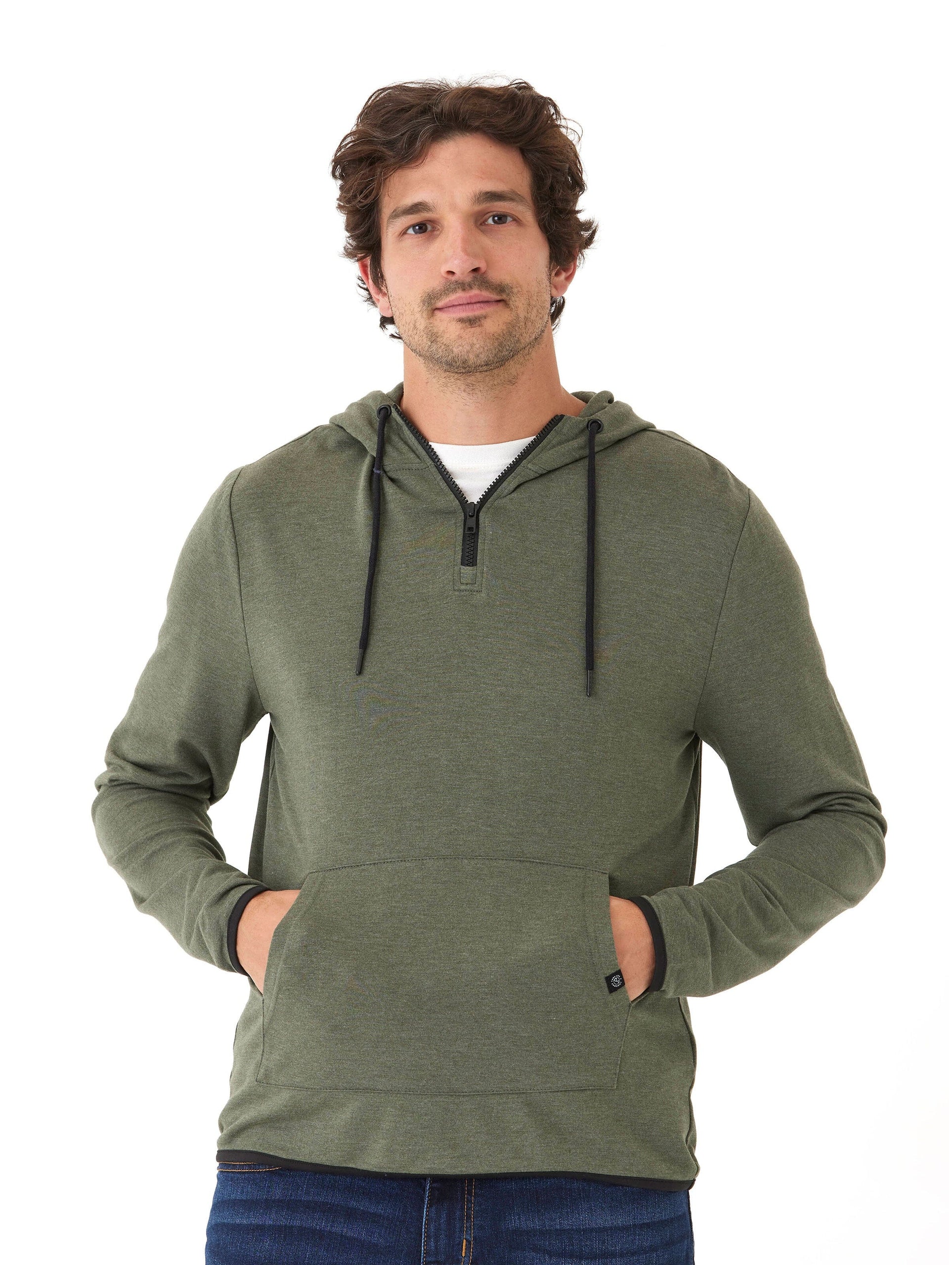 Men wearing a muted olive green 1/4 zip knit feather fleece hoodie with black contrast trim.