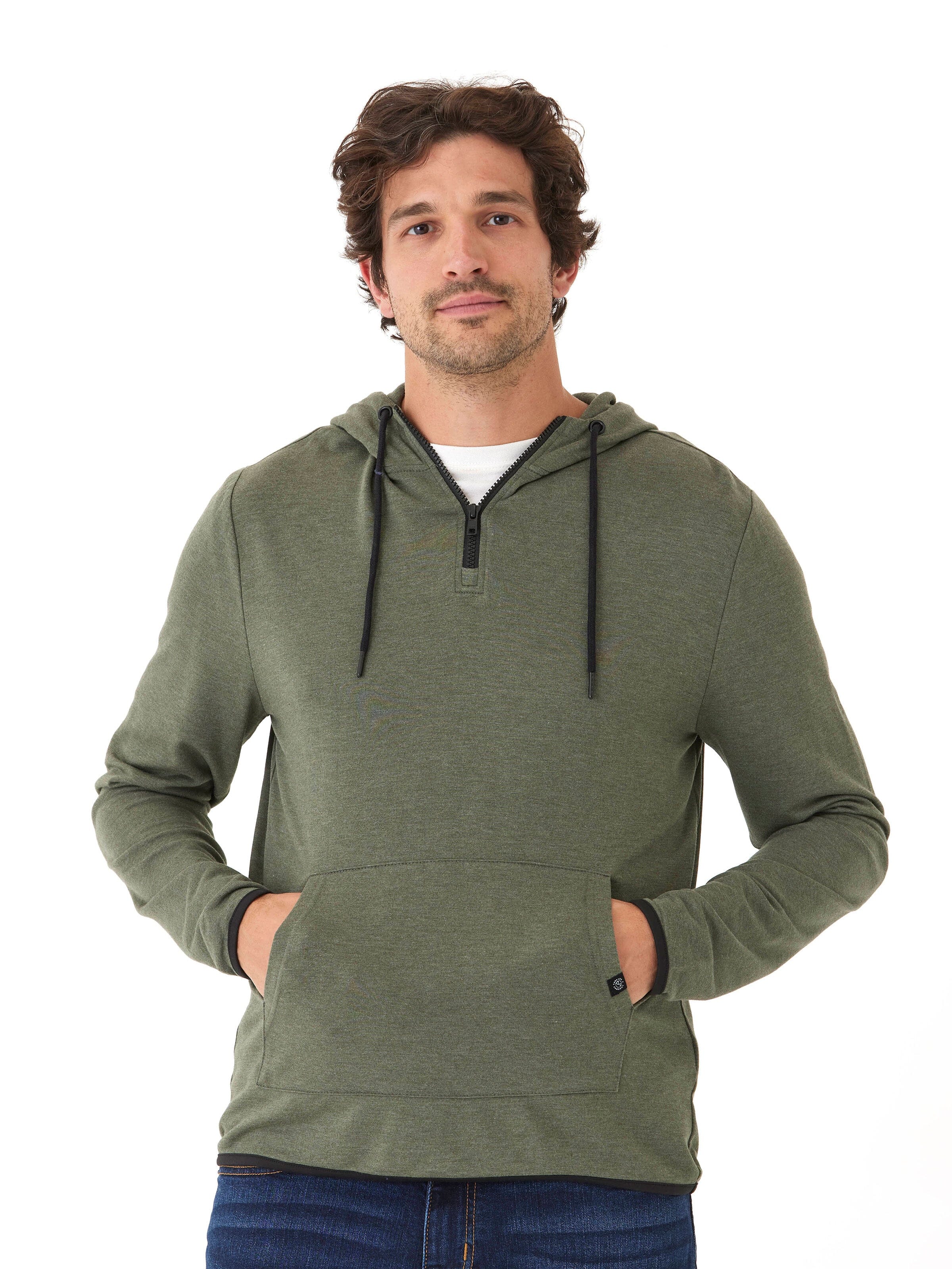 Men wearing a muted olive green 1/4 zip knit feather fleece hoodie with black contrast trim.