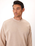 A comfortable Rudy Triblend Fleece Drop Shoulder Sweatshirt in a neutral tone, featuring a soft brushed-back fleece interior.