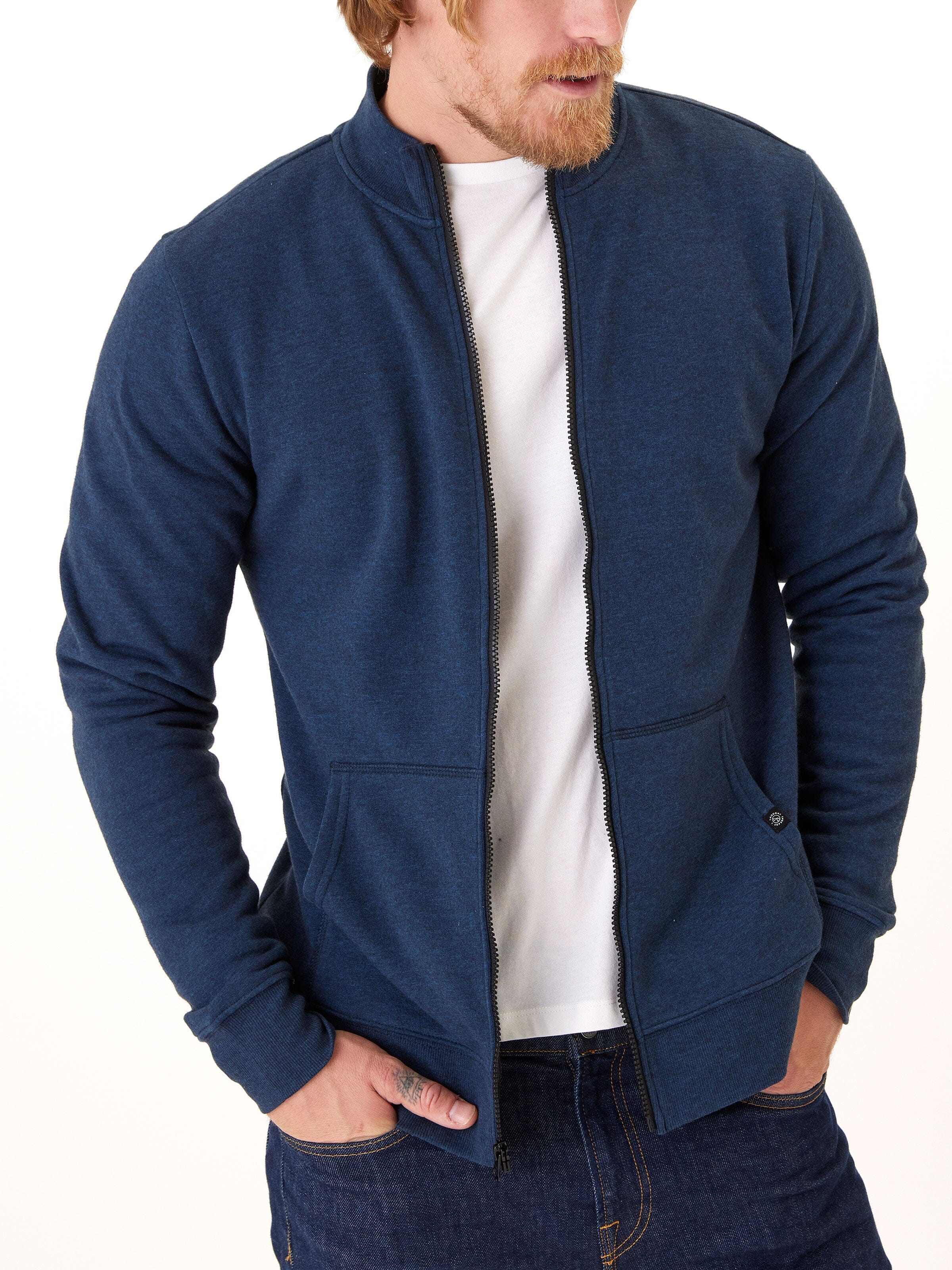 Men wearing a heathered navy blue Brandon Triblend Fleece Full Zip Jacket with a collared neckline.