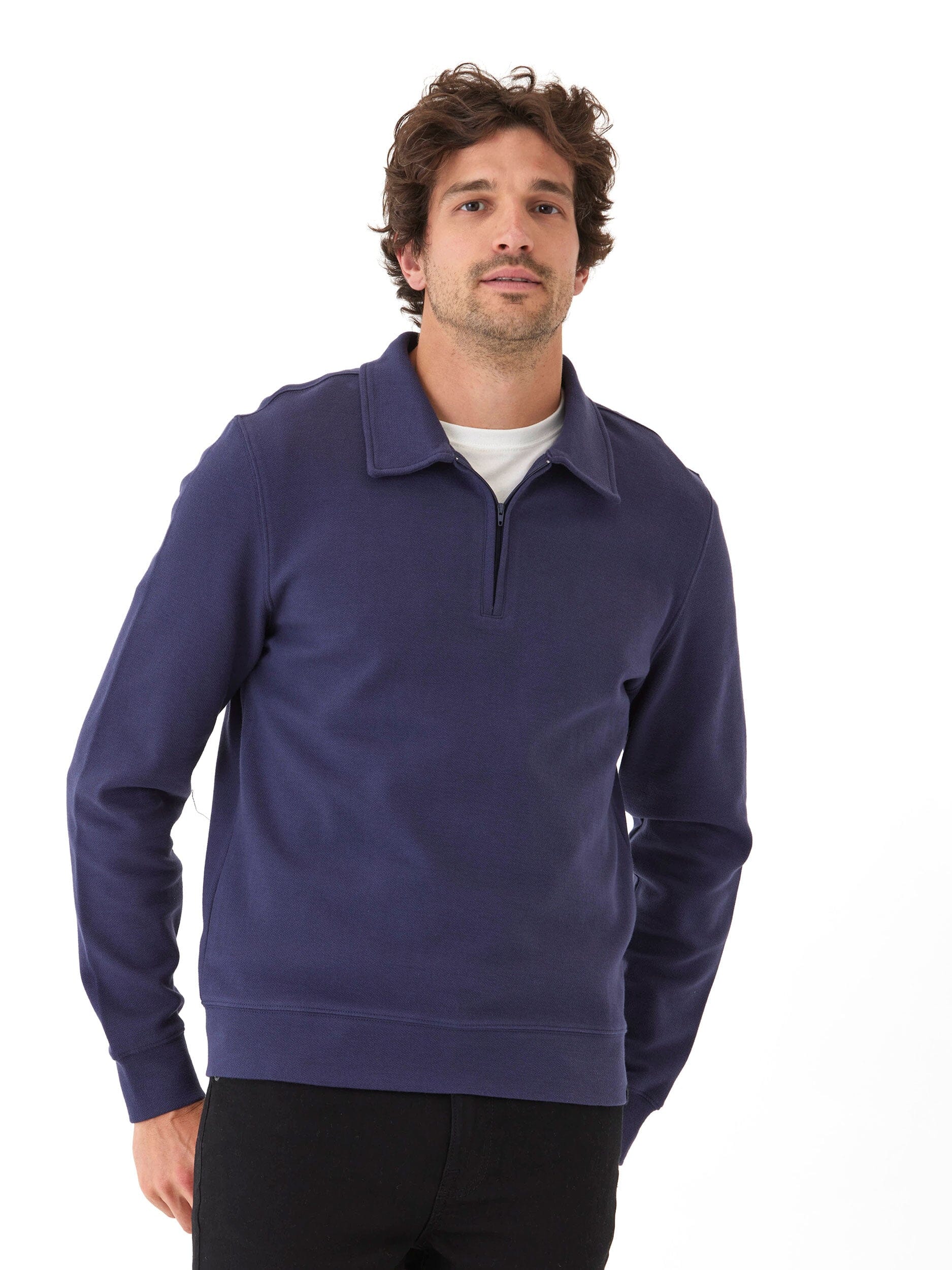 Men wearing a navy blue Briggs knit jacquard 1/4 zip pullover with textured fabric detailing.