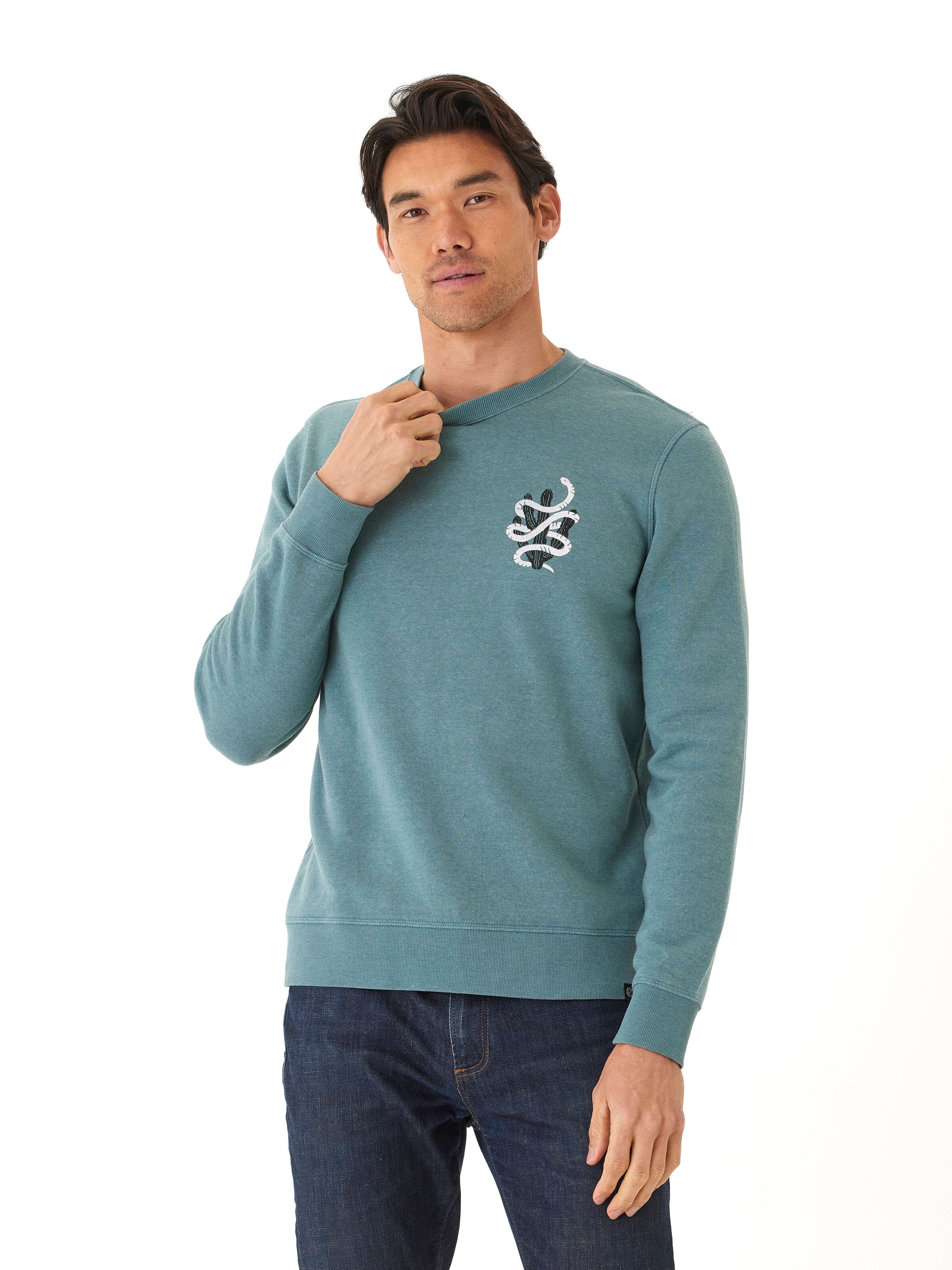 Close-up of the mineral wash texture on a comfortable graphic fleece crew neck pullover