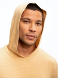 Unisex long sleeve triblend hoodie in gold yellow, featuring a casual knit tee-shirt design.