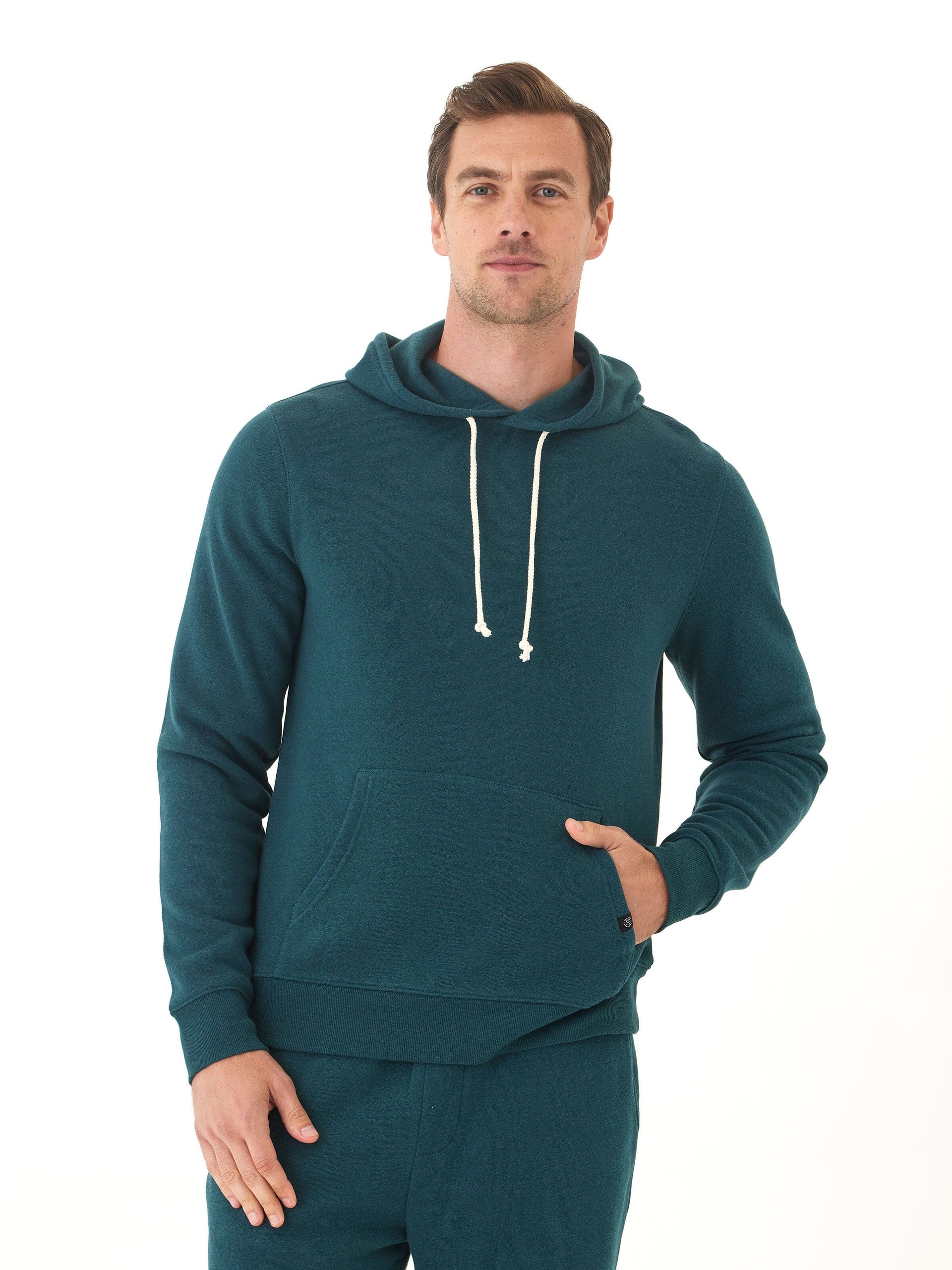 Men's Core Triblend Fleece Pullover Hoodie in teal, featuring a classic kangaroo pocket
