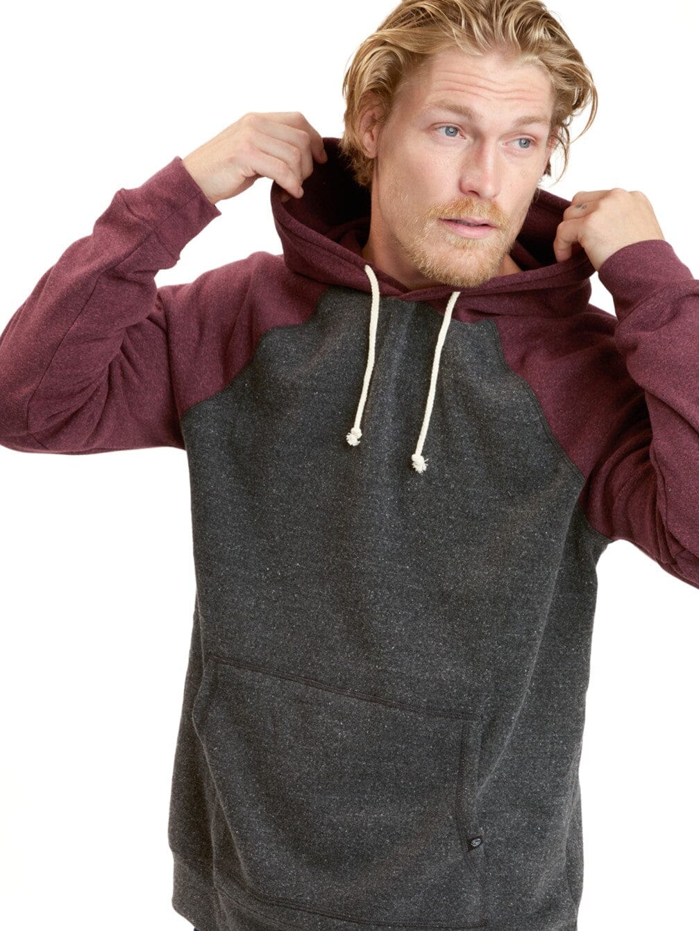 Close up view of the Colorblock Raglan Triblend Hoodie featuring signature soft fleece fabric