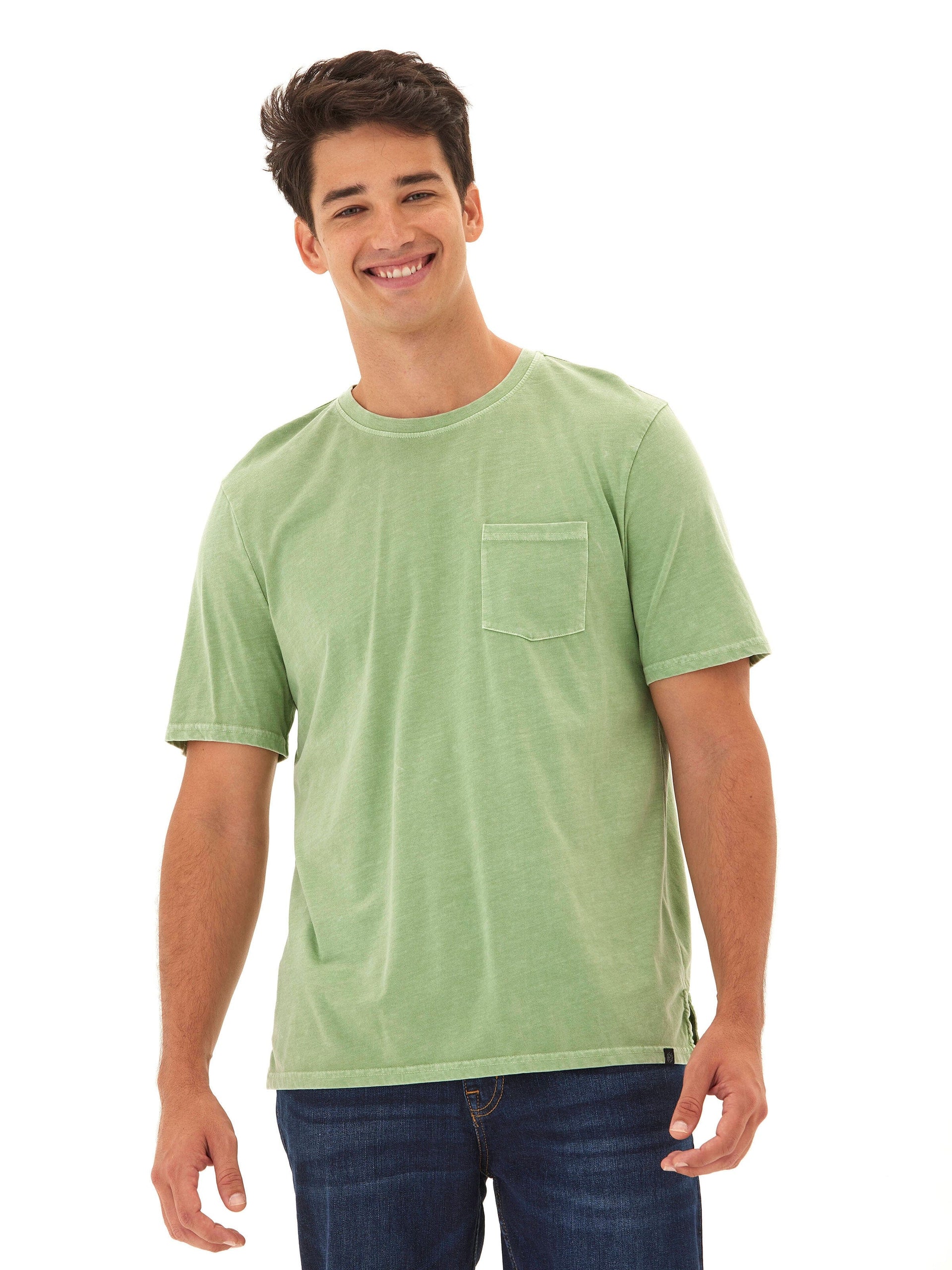 Close up of a green Skipper Mineral Wash Tee showcasing the vintage texture and fabric quality.