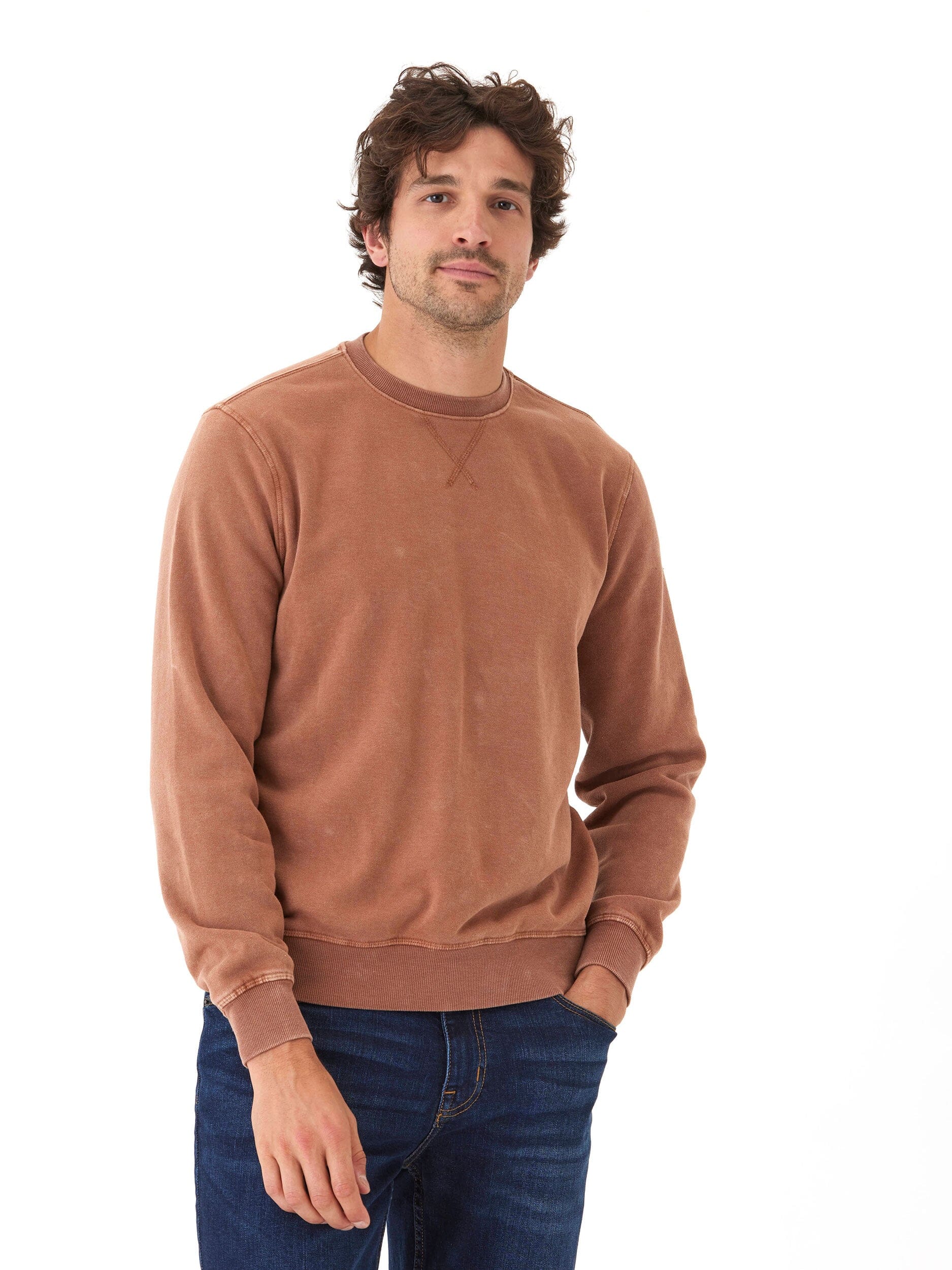 Mineral Wash Fleece Crew Neck pullover in copper, showcasing the unique mineral wash fabric texture.