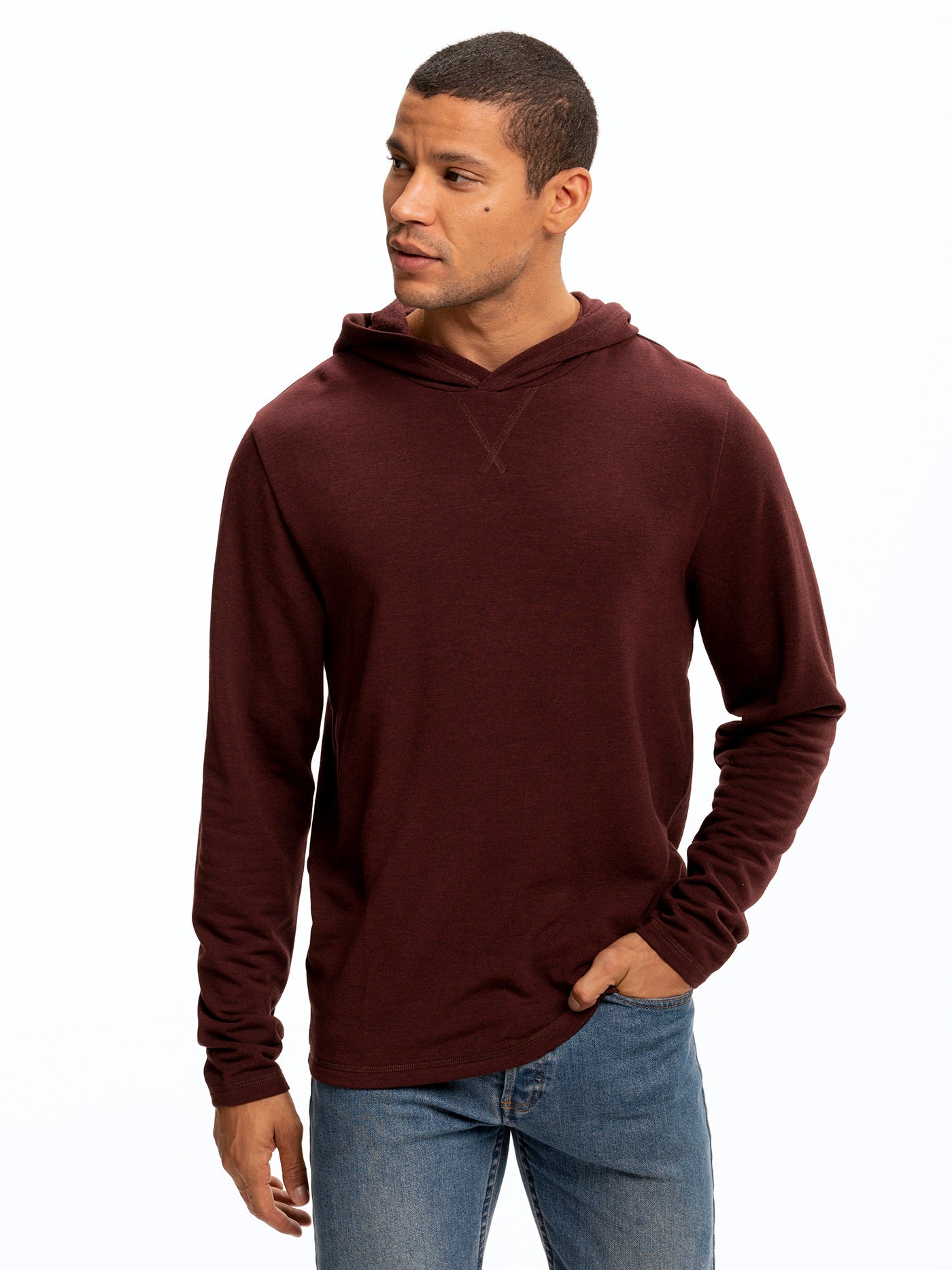 Men's Core Feather Fleece hoodie in solid maroon, featuring a relaxed hood and knit construction.