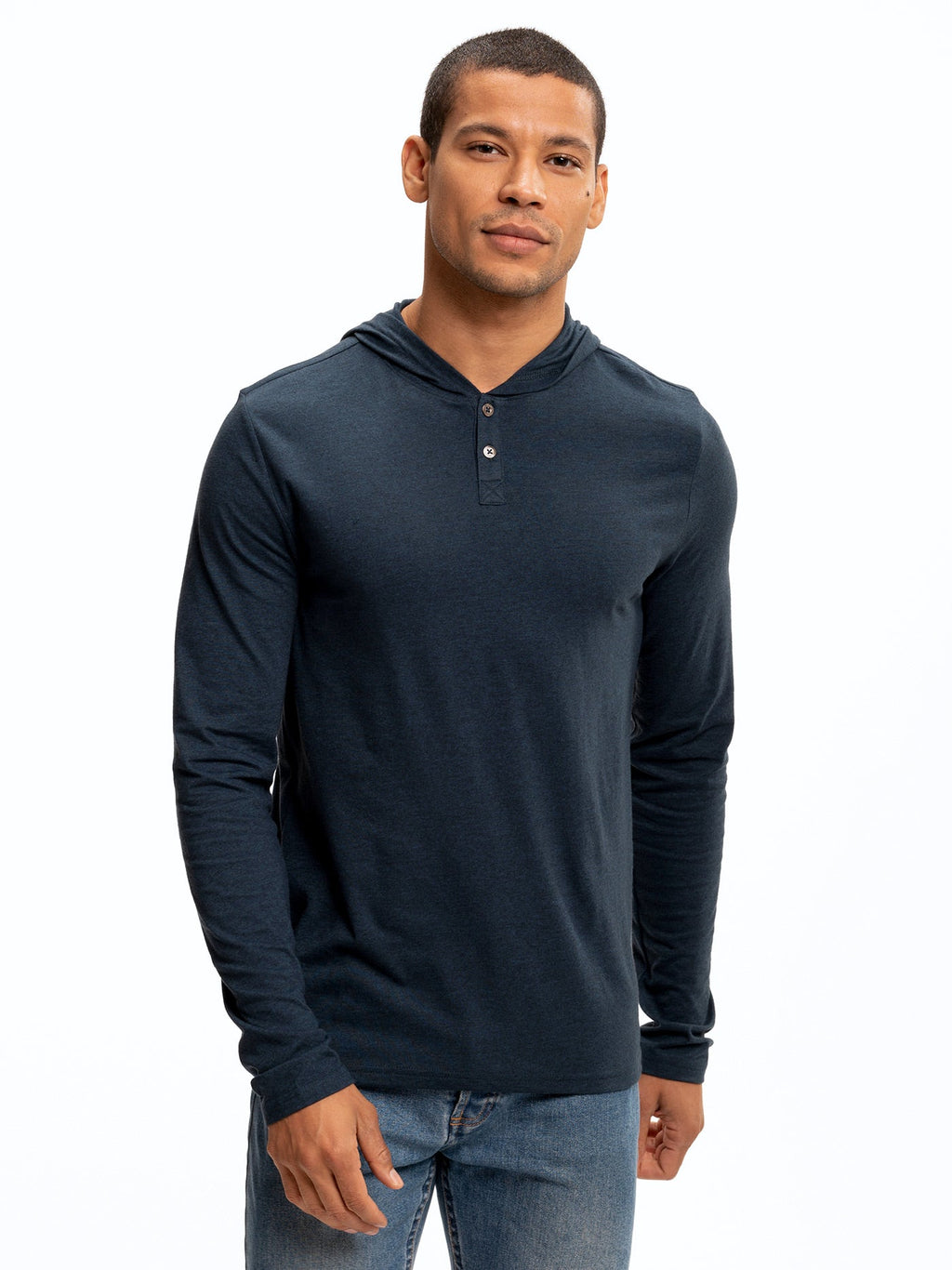 Men wearing a navy blue long sleeve knit henley hoodie with a 2-button closure.