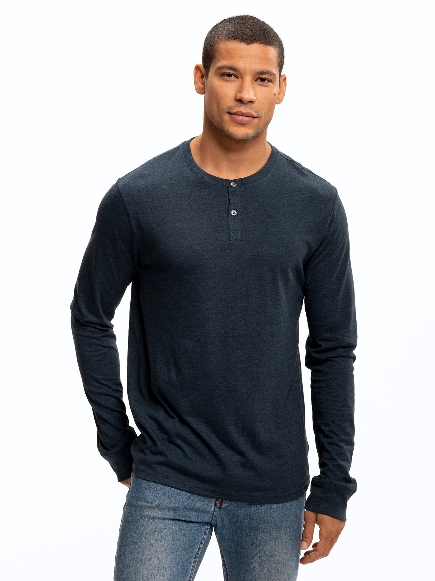 Close up of the Baseline Long Sleeve Triblend Henley featuring a 2-button placket and contrast trim detailing.