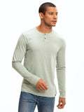 Baseline Long Sleeve Triblend Henley in sage with 2-button closure and contrast trim.