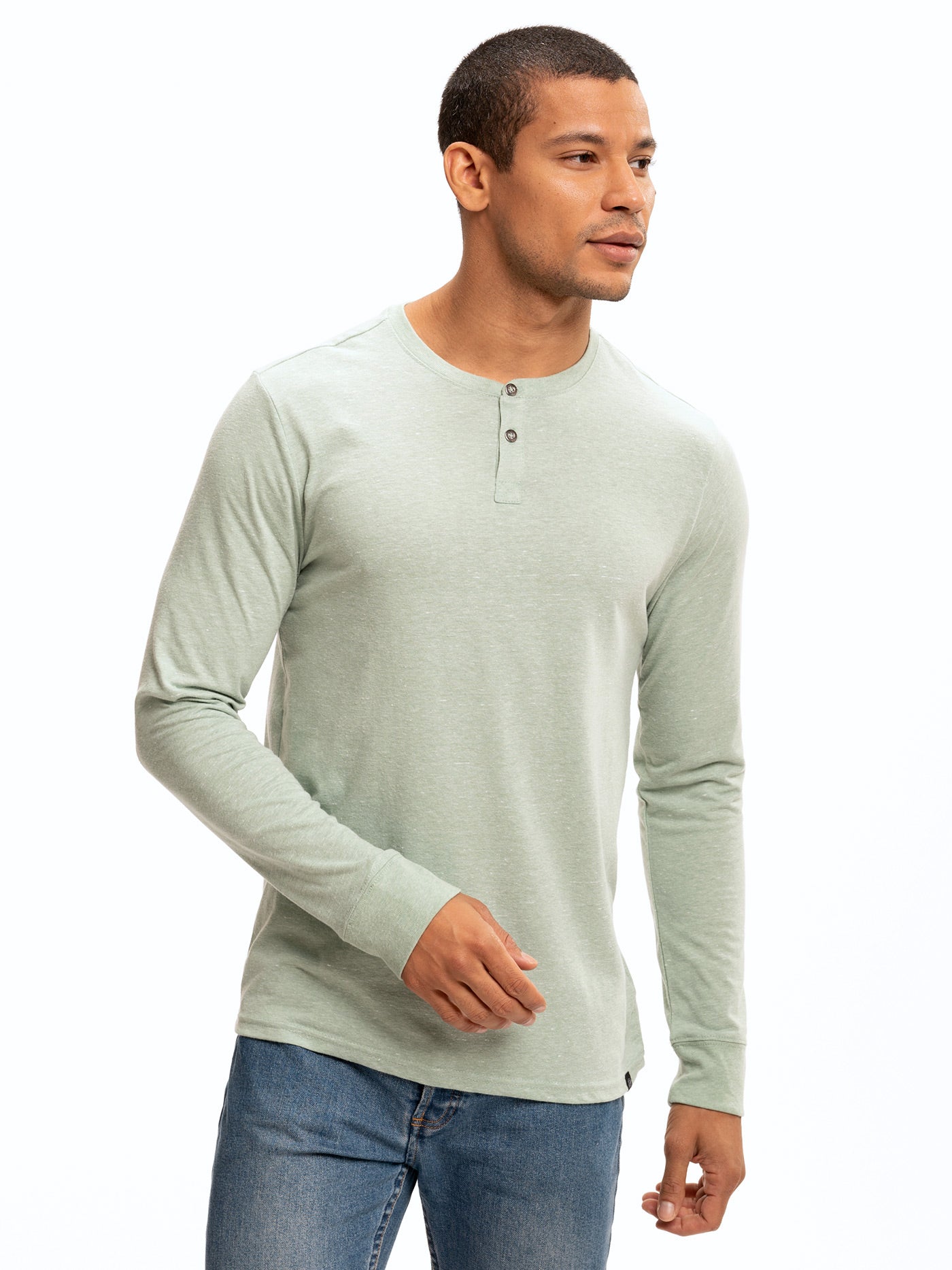 Baseline Long Sleeve Triblend Henley in sage with 2-button closure and contrast trim.