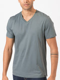 Men's Invincible V-Neck tee in slate-blue and grey, showcasing liquid-resistant organic cotton fabric