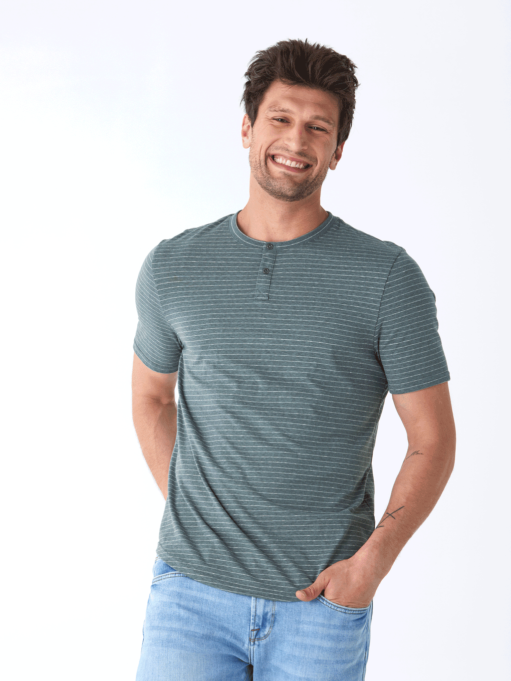 Close-up of a striped muted-green and white short sleeve henley in soft triblend fabric.