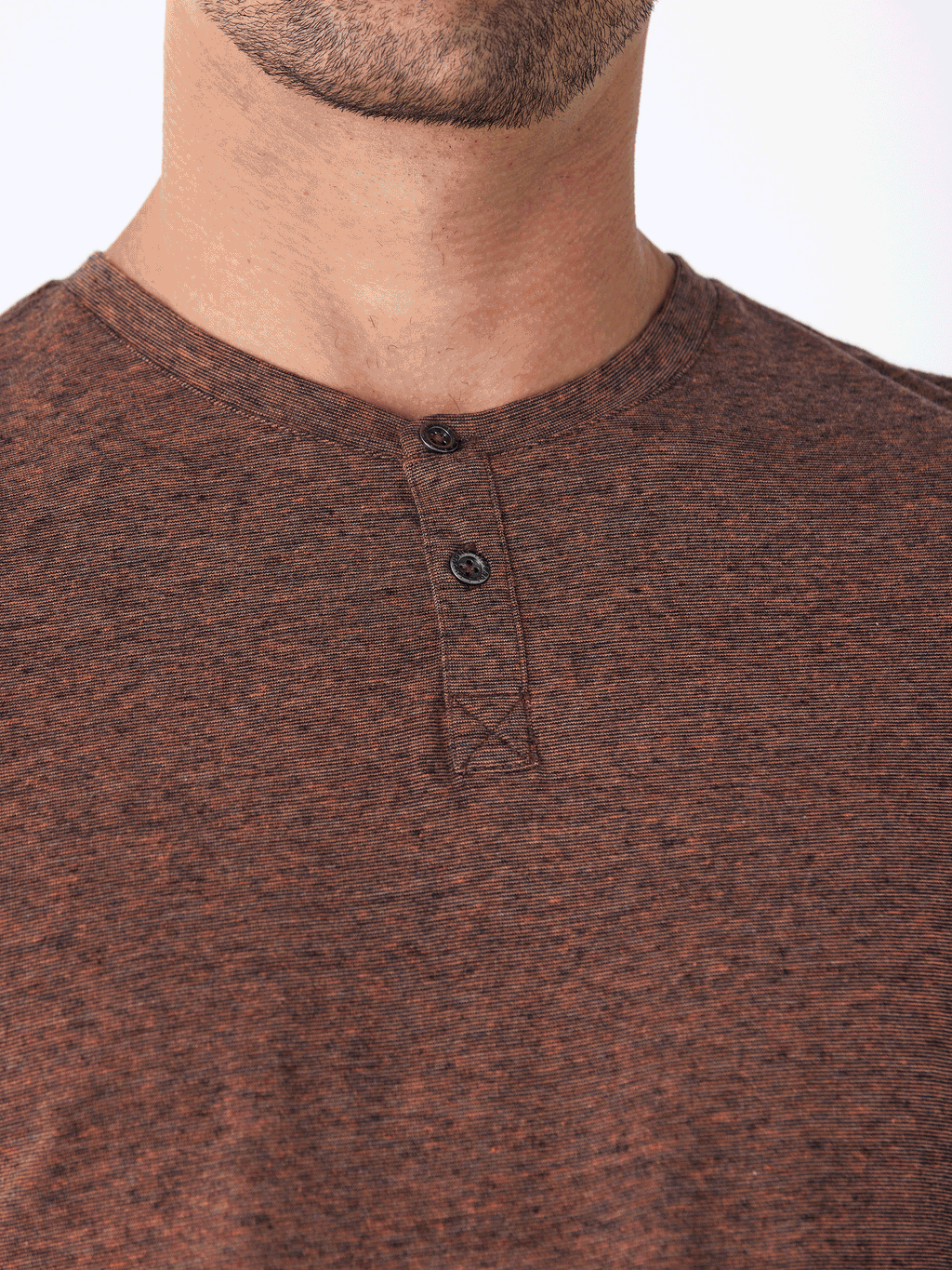 Close-up of Black Fleck Triblend Henley shirt showing texture and three-button placket detail