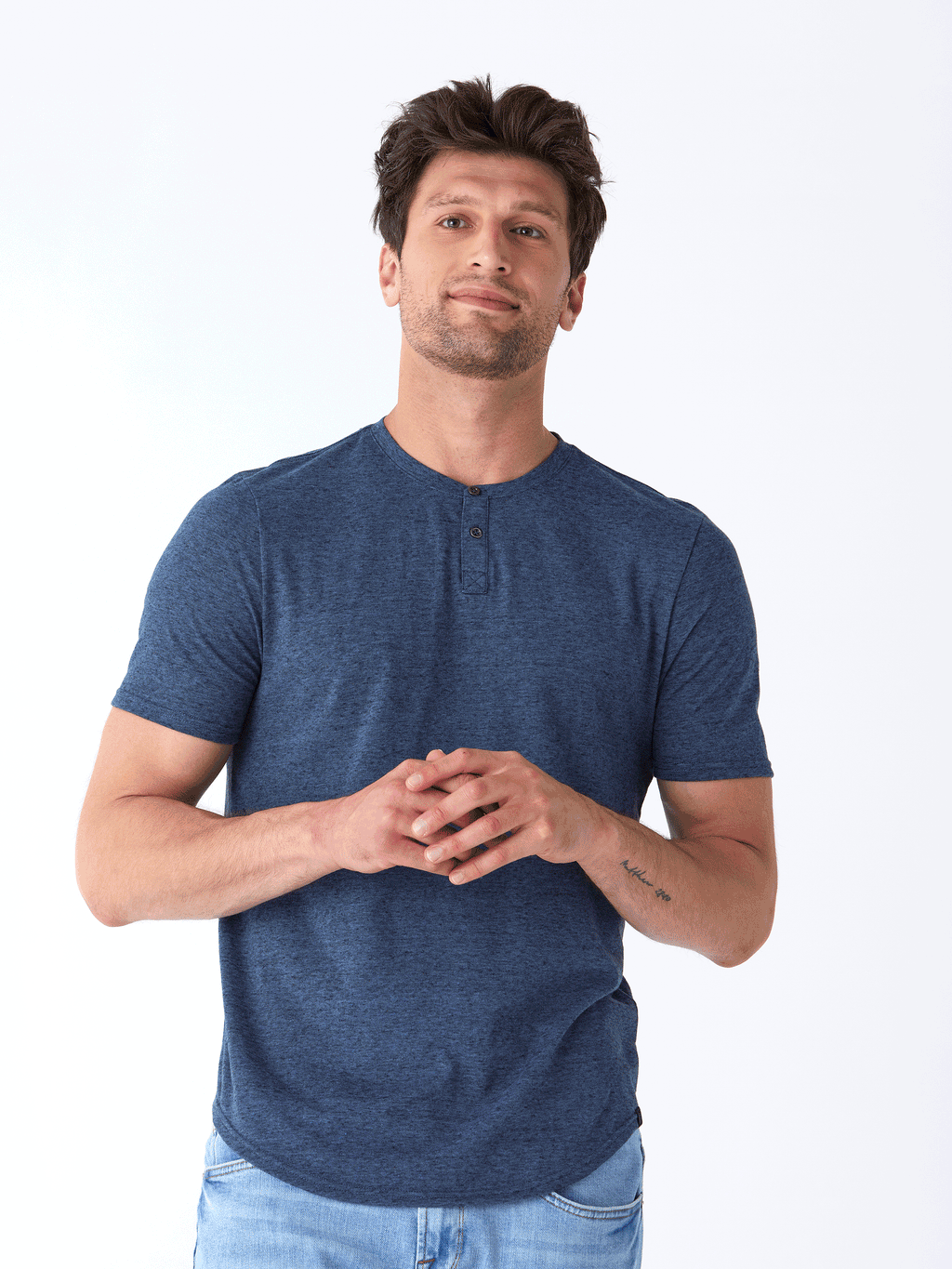 Close up of Black Fleck Triblend Henley shirt showing button placket and fabric texture