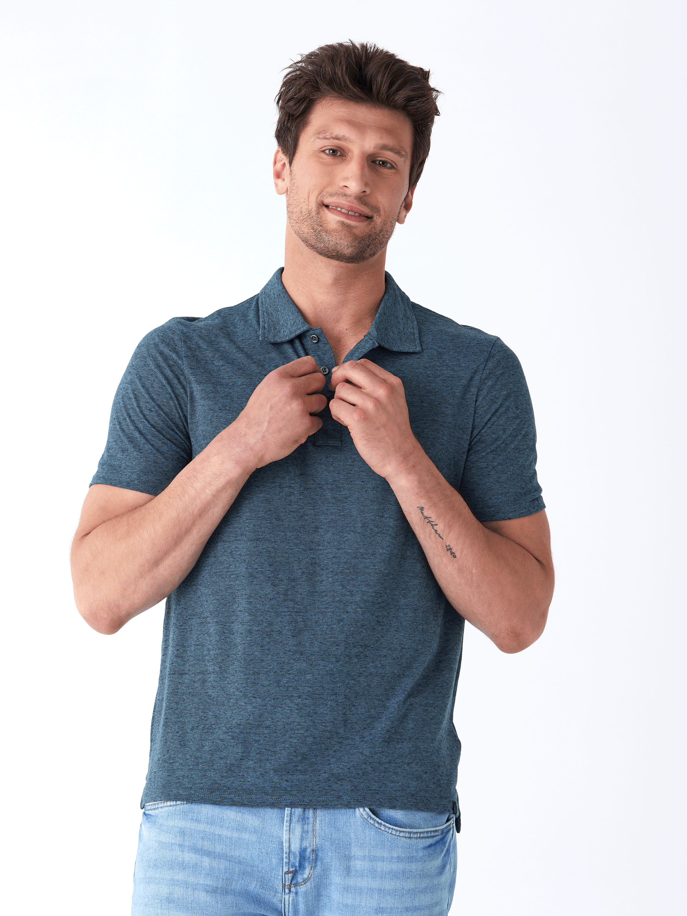 Close up of Black Fleck Triblend Jersey Polo showing textured fabric detail and classic collar