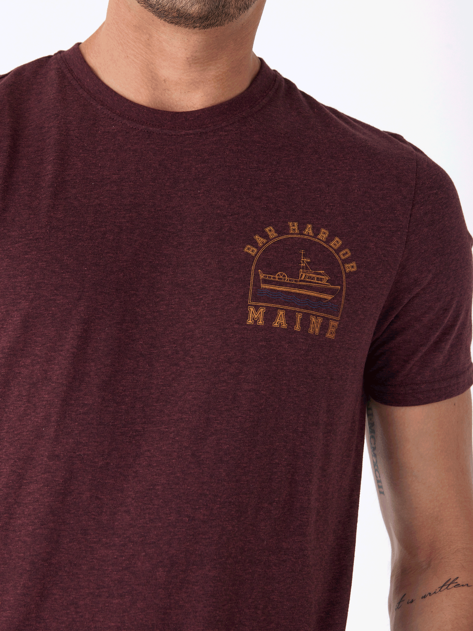 Close up of a maroon Triblend Graphic Tee with unique hand-created design