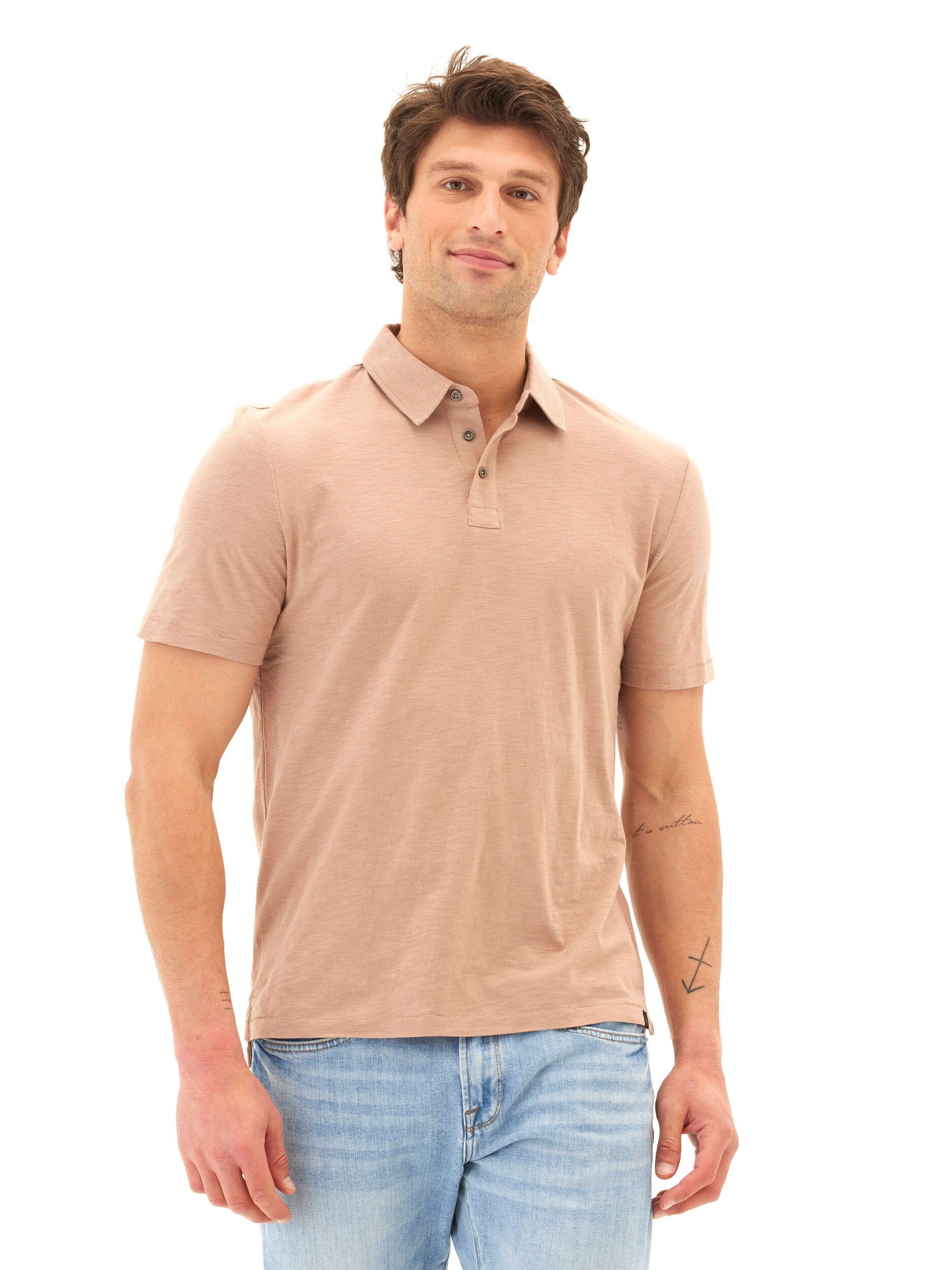 Close-up of a soft organic cotton slub jersey polo shirt showing the textured fabric weave