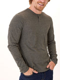 Braeden long sleeve black fleck triblend henley shirt on a neutral background