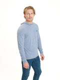 Men wearing a blue long sleeve triblend t-shirt hoodie in a casual outdoor setting