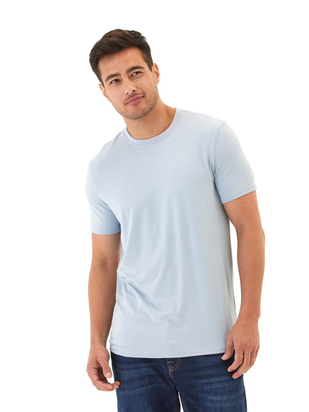 A man wearing a minimalist light blue Men's Core Luxe Jersey crew neck tee with a straight fit.