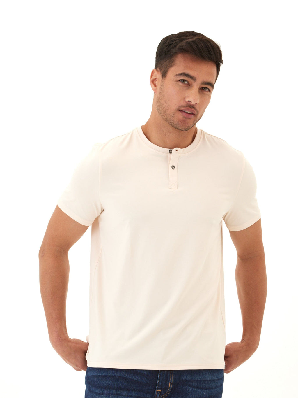 A men's cream-colored 2-button henley shirt made from soft knit jersey fabric.