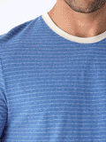Close up of a striped triblend jersey crew neck t-shirt with elevated neck detail