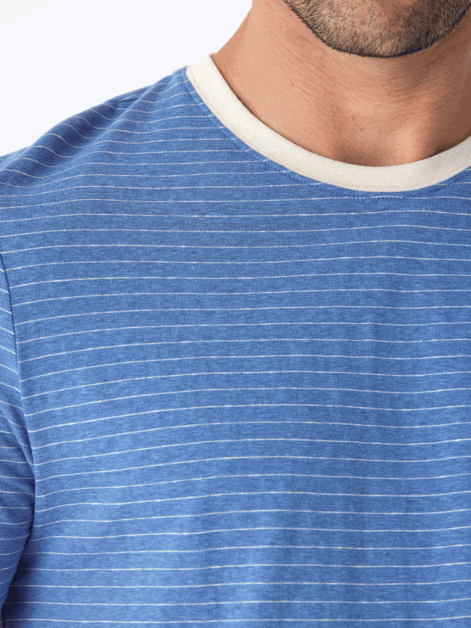 Close up of a striped triblend jersey crew neck t-shirt with elevated neck detail