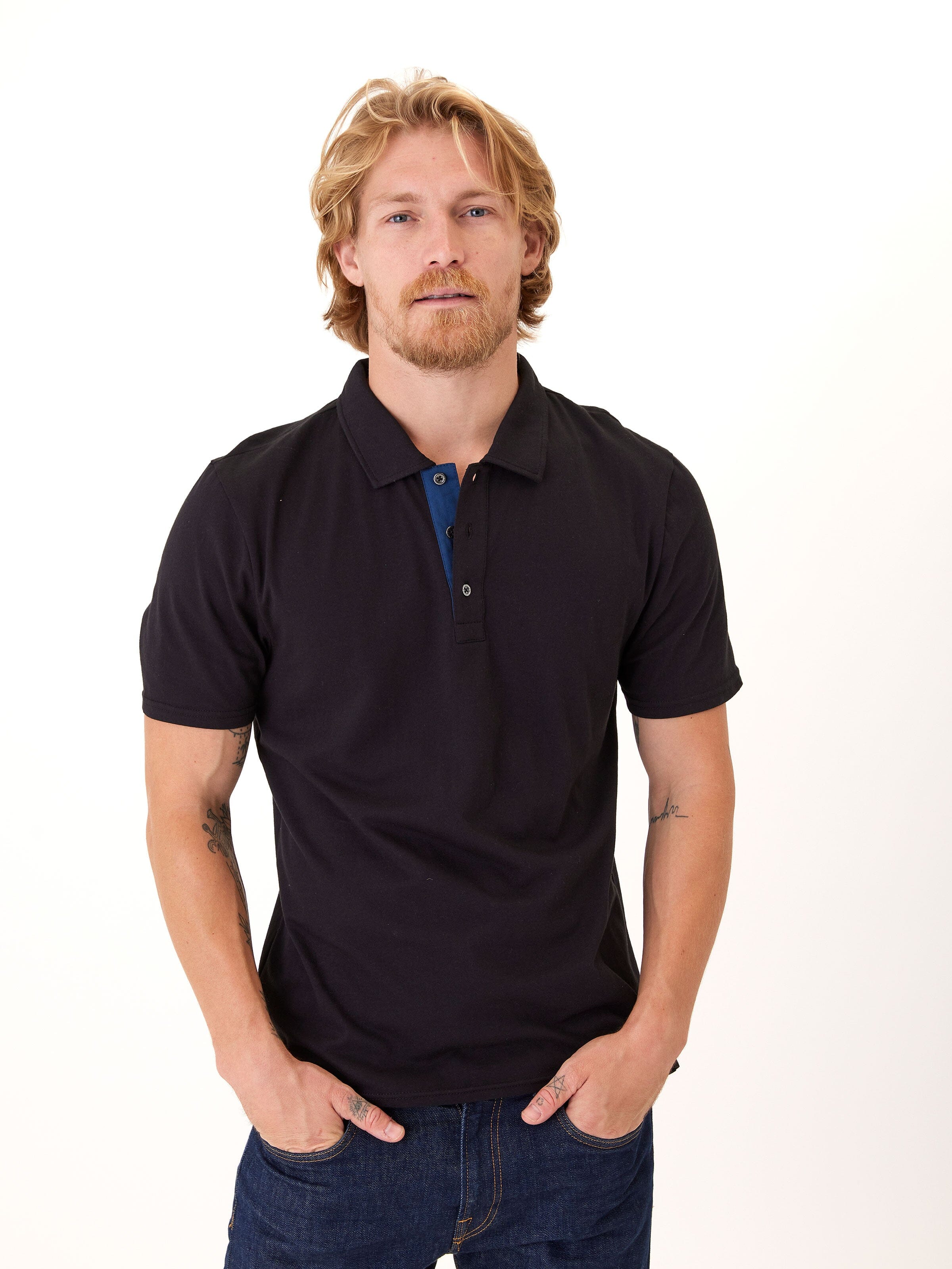 Close up of Ashton Organic Cotton Polo showing contrast placket and soft cotton texture