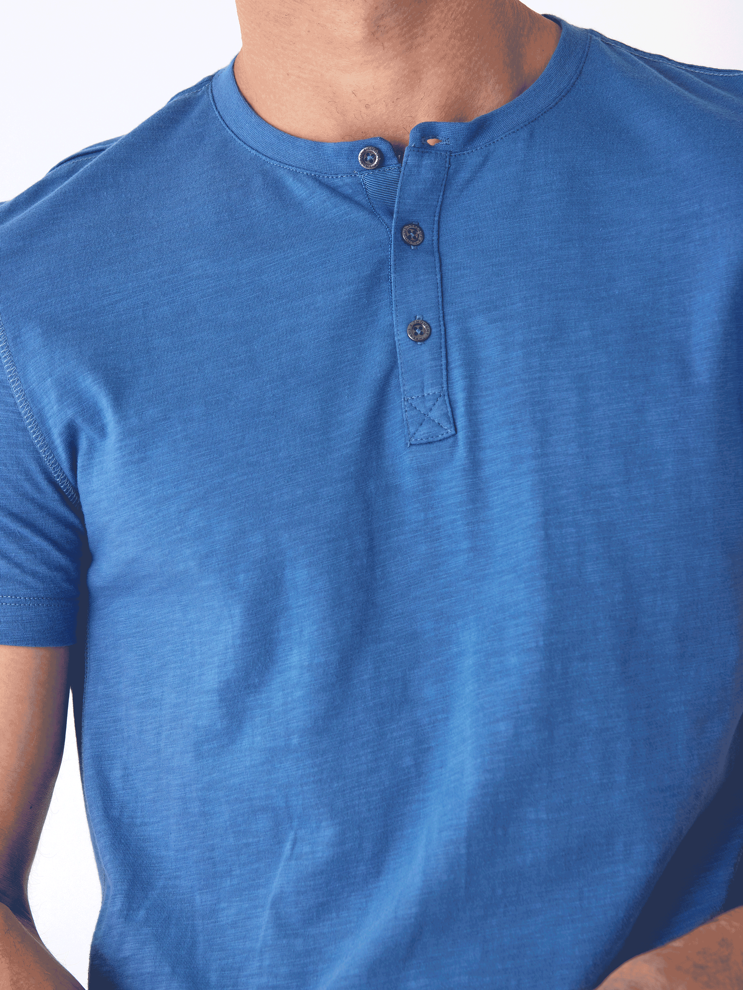 Close up of a Heath Slub Jersey Short Sleeve Henley in organic cotton with 3-button detail.