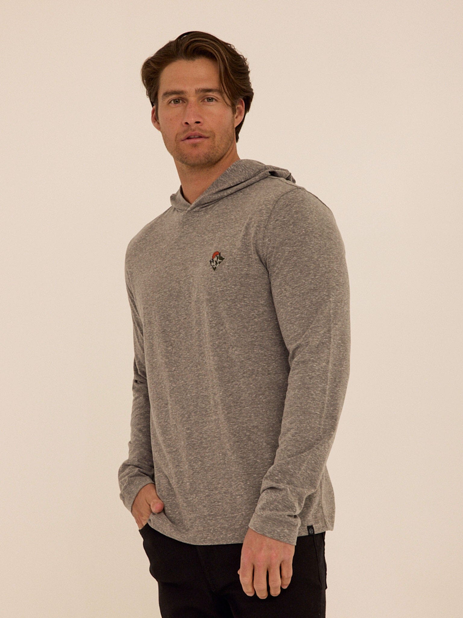 Men's grey long sleeve hoodie tee with embroidery detail, knit fabric.