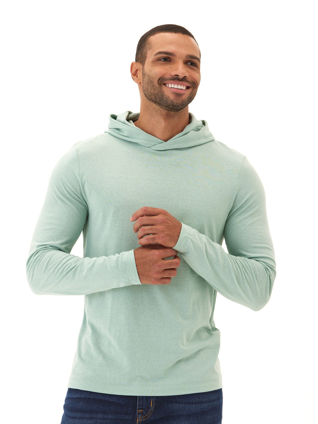 Men wearing a solid mint green long sleeve triblend hooded t-shirt