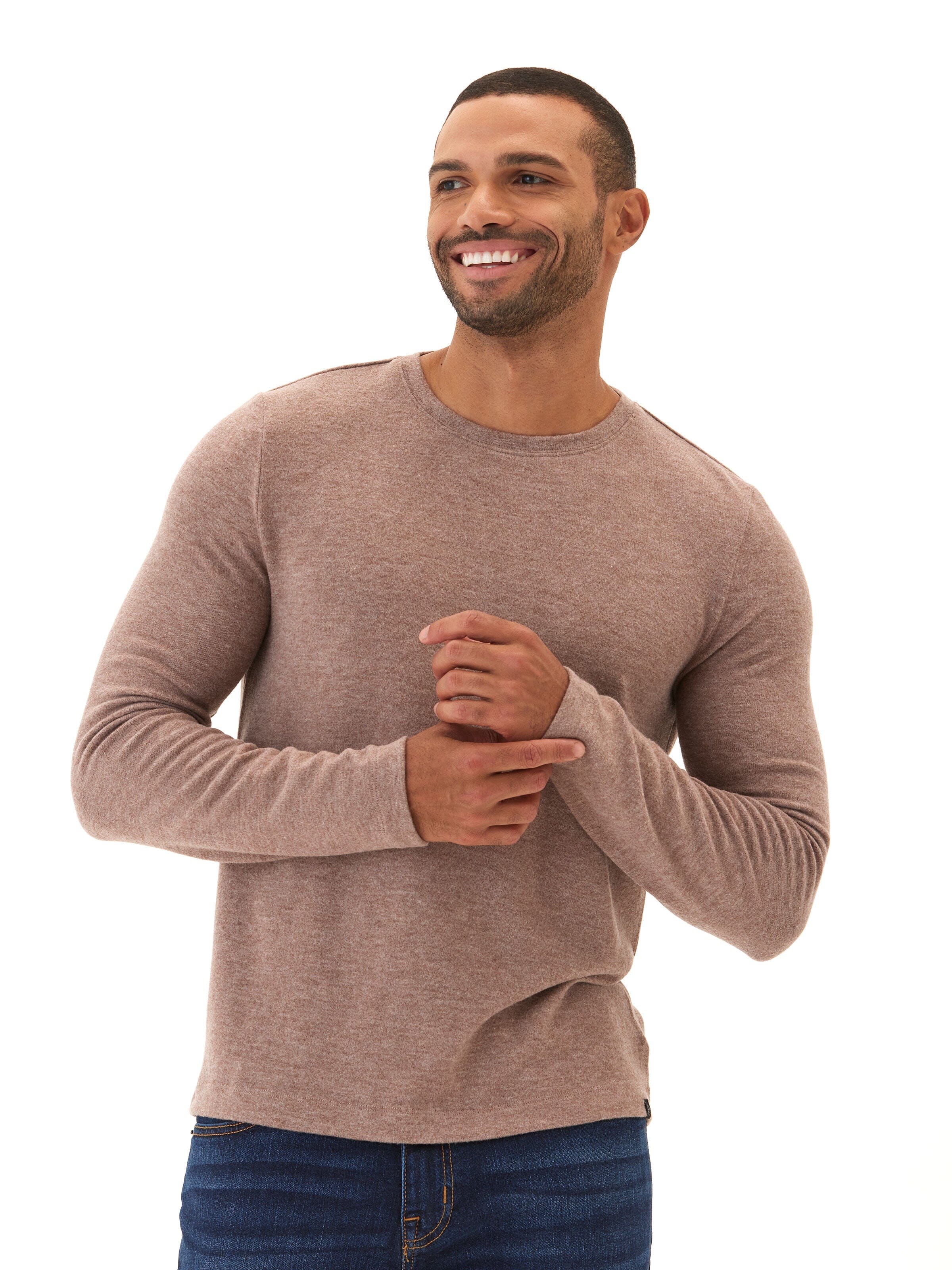 Model wearing a soft-touch Gill Sweater Knit Long Sleeve Tee in a classic fit