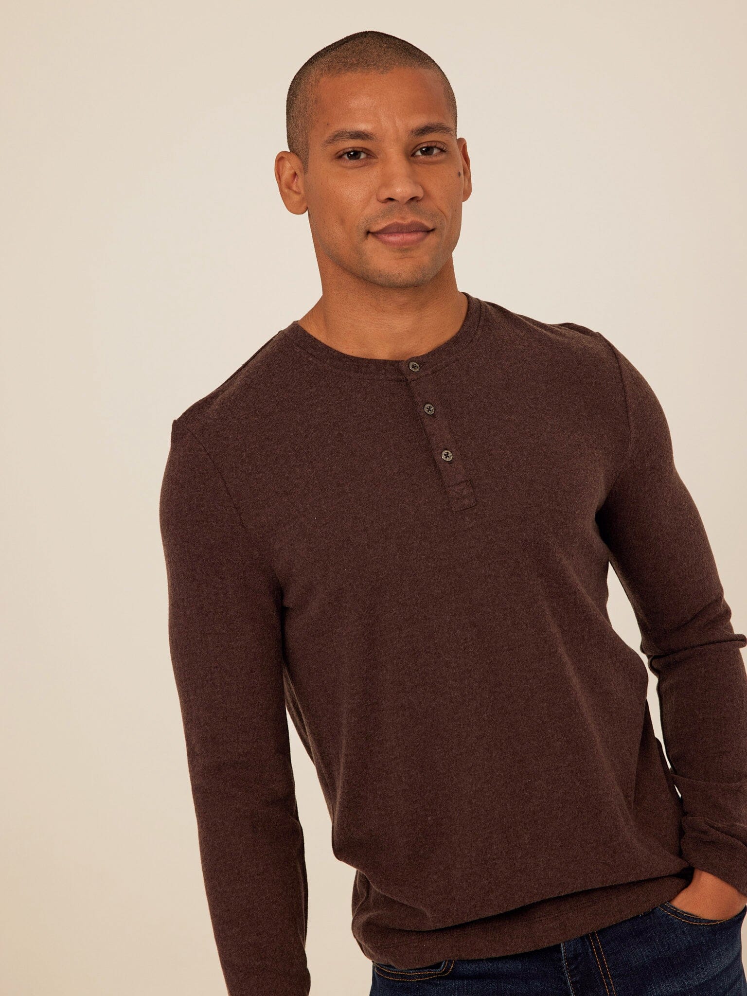 Men's Elias Long Sleeve Henley in dark brown knit fabric featuring a classic button placket