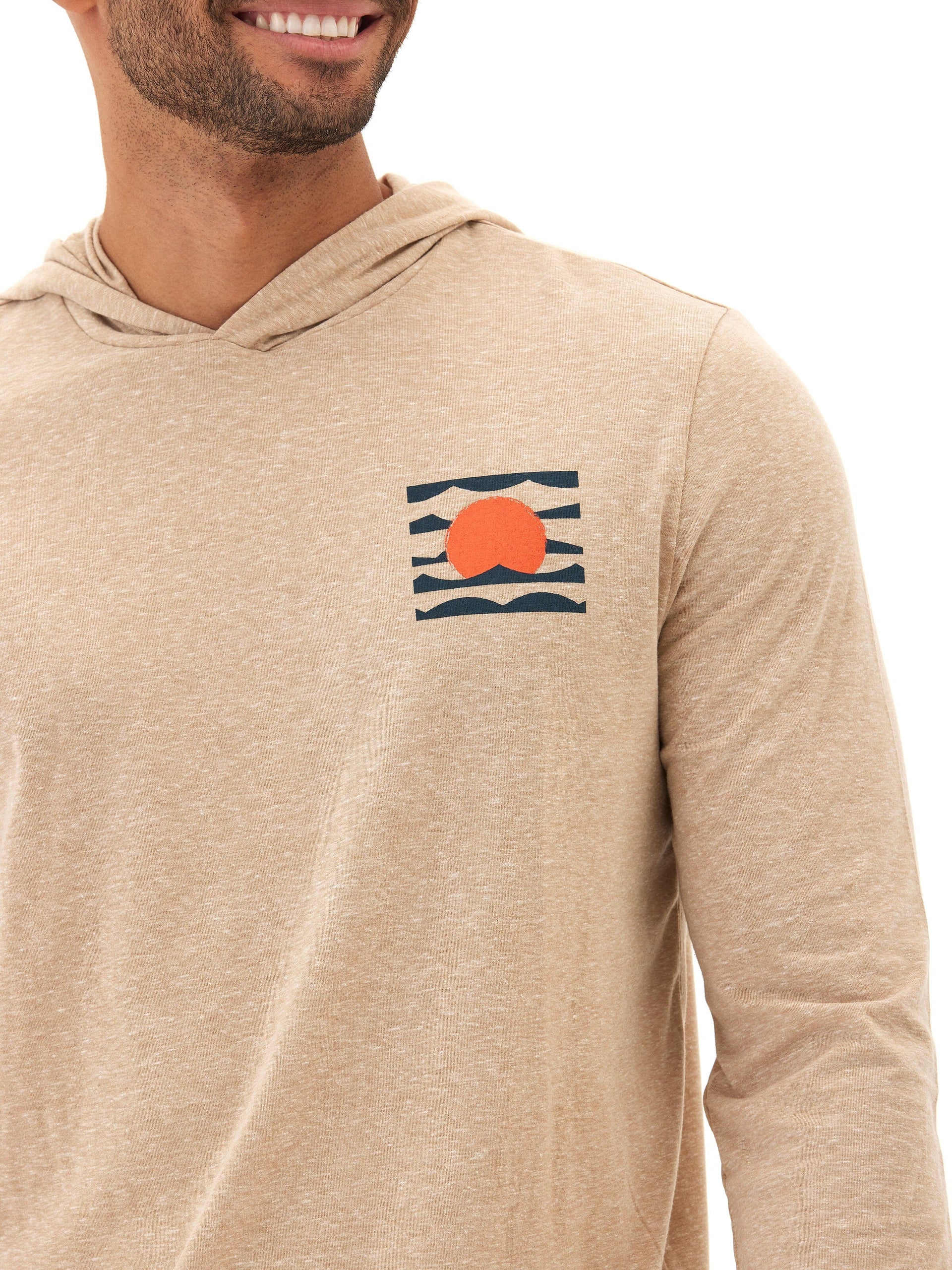 Close up of eco-triblend long sleeve pullover hoodie with subtle chest embroidery detail