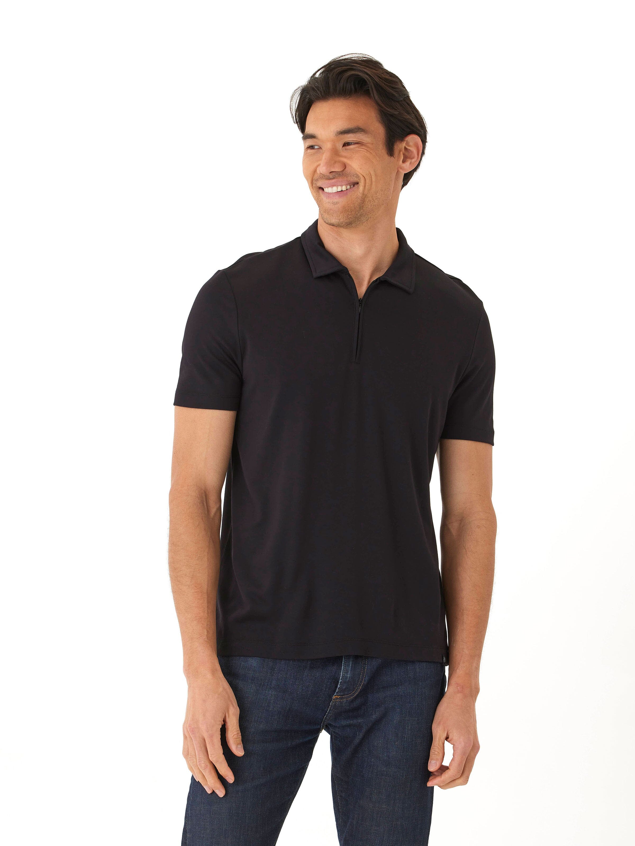 Close-up of a men's black Erick Peached Pique ¼ Zip SS Polo featuring a collared neckline and quarter-zip closure.