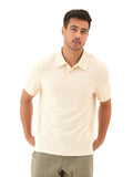 Close-up view of the Darryn Jacquard Terry 2-Button Polo in Cream featuring geometric knit texture