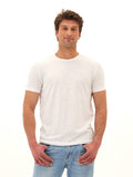 Men wearing a white slub linen short sleeve crew neck tee with a textured finish