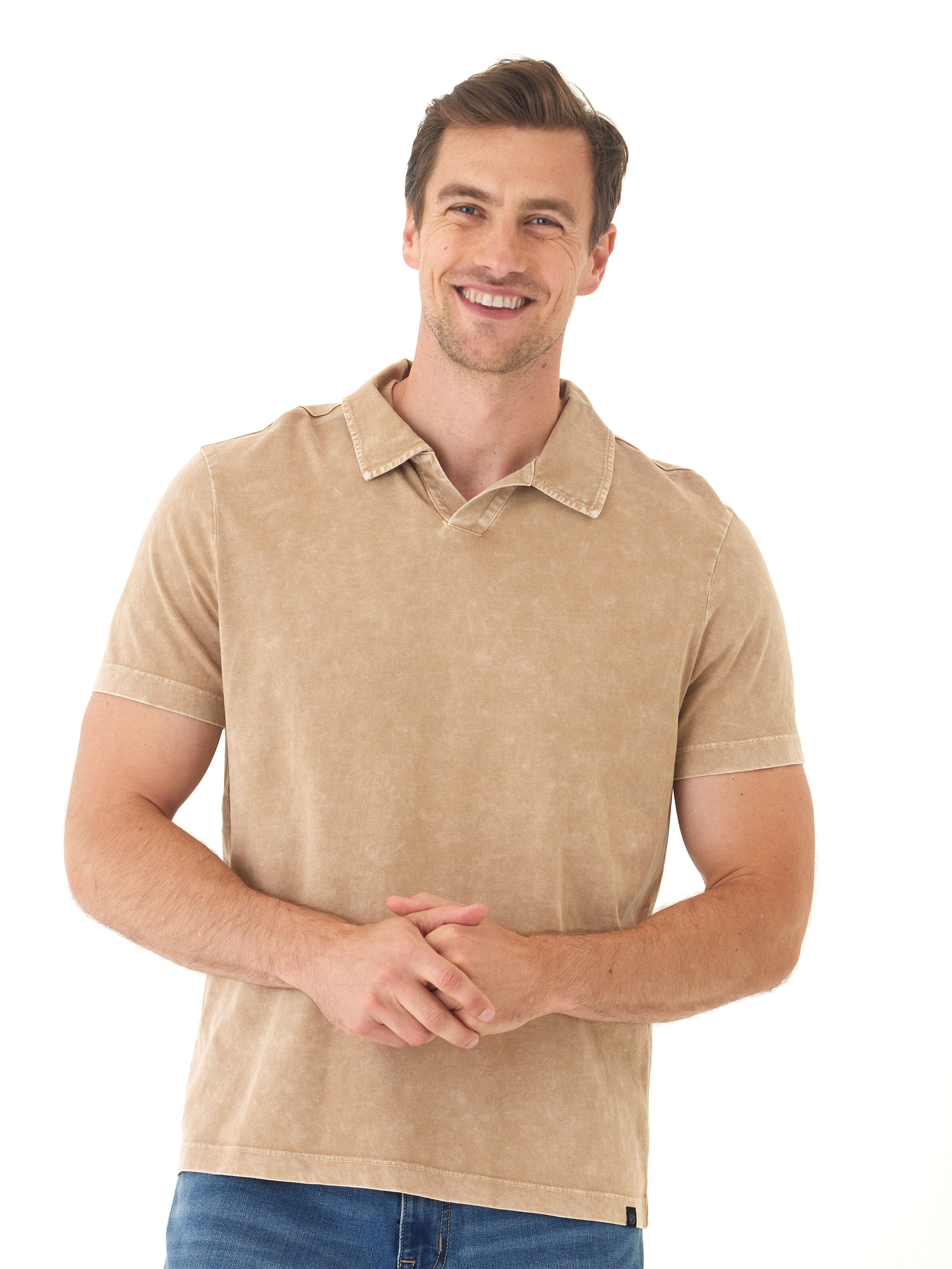 Men's Jared mineral wash polo in tan featuring an open collar and raw edge details