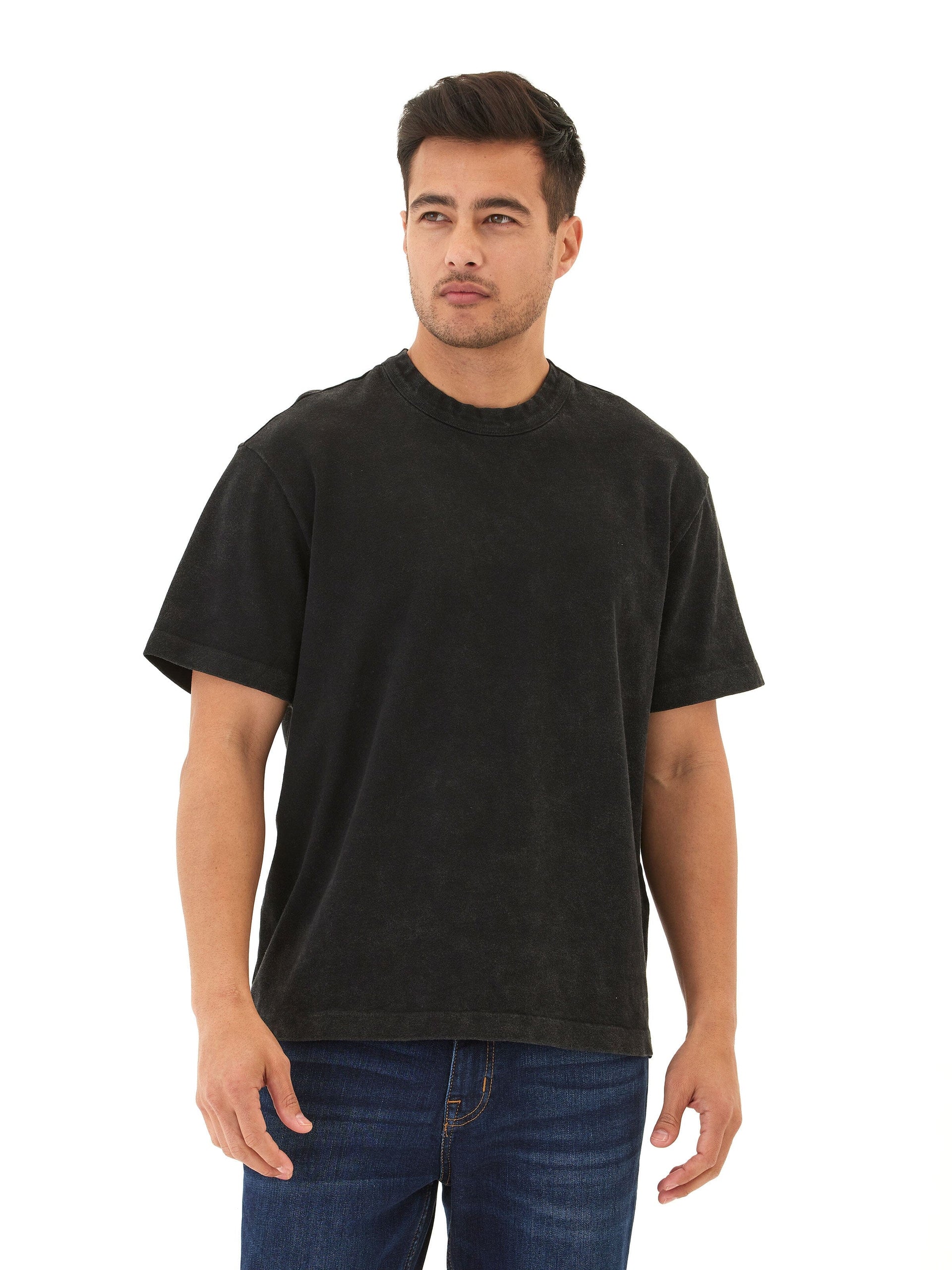 Close-up of a men's Johnny relaxed fit jersey tee in charcoal showing the mineral wash texture.