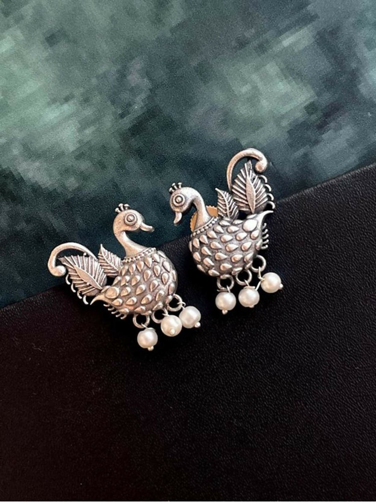 Pair of Oxidised brass stud earrings with a rustic finish