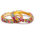 Gold-polished brass bangle set with vibrant multi-colored bead work