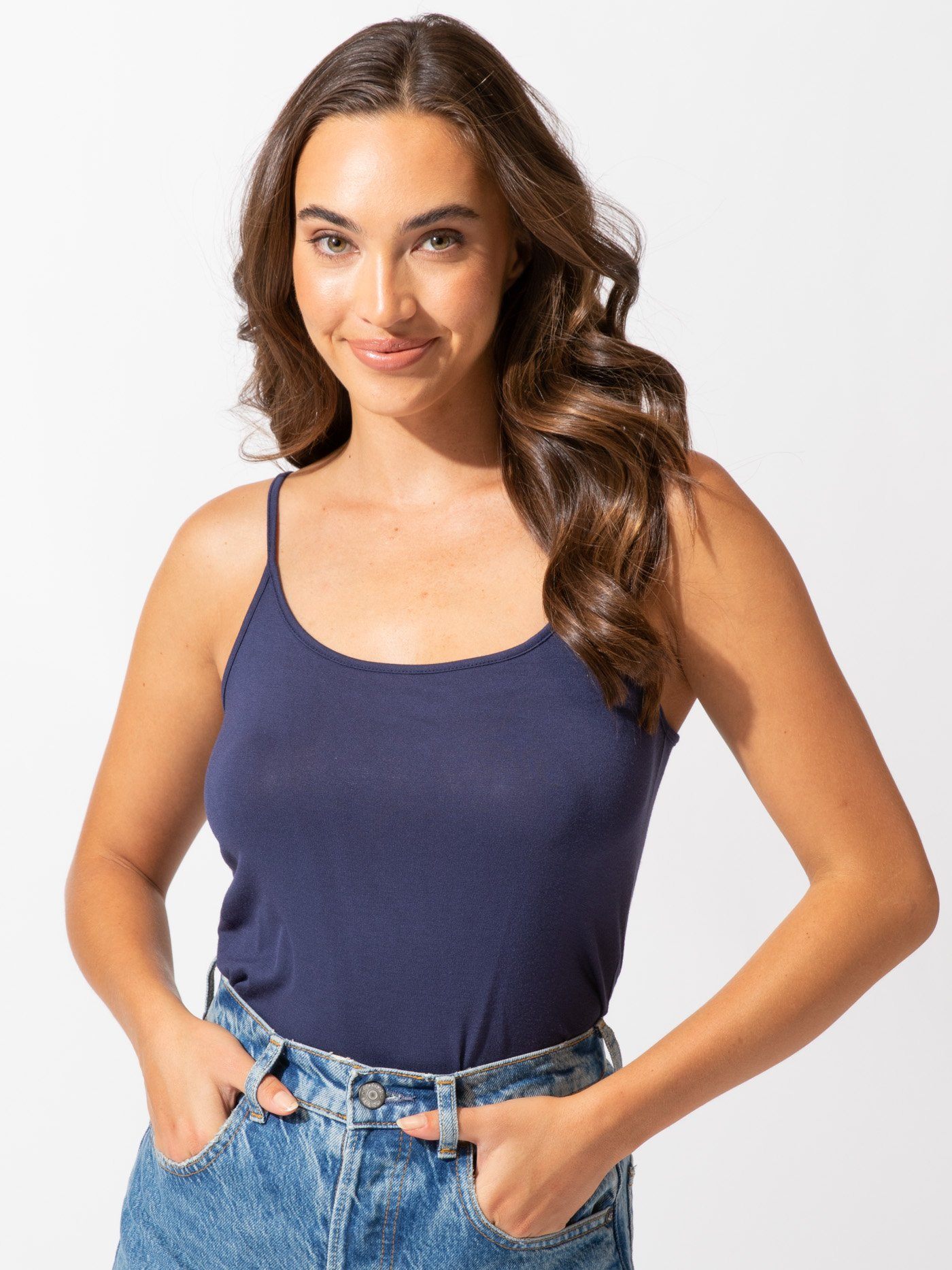 Women wearing a minimalist navy blue knit cami tank top