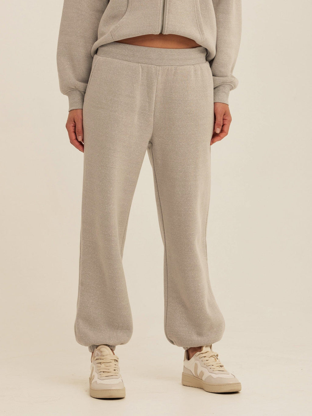 Close up of soft Triblend Fleece fabric on a pair of relaxed fit grey joggers