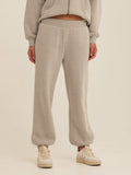 Close up of soft Triblend Fleece fabric on a pair of relaxed fit grey joggers