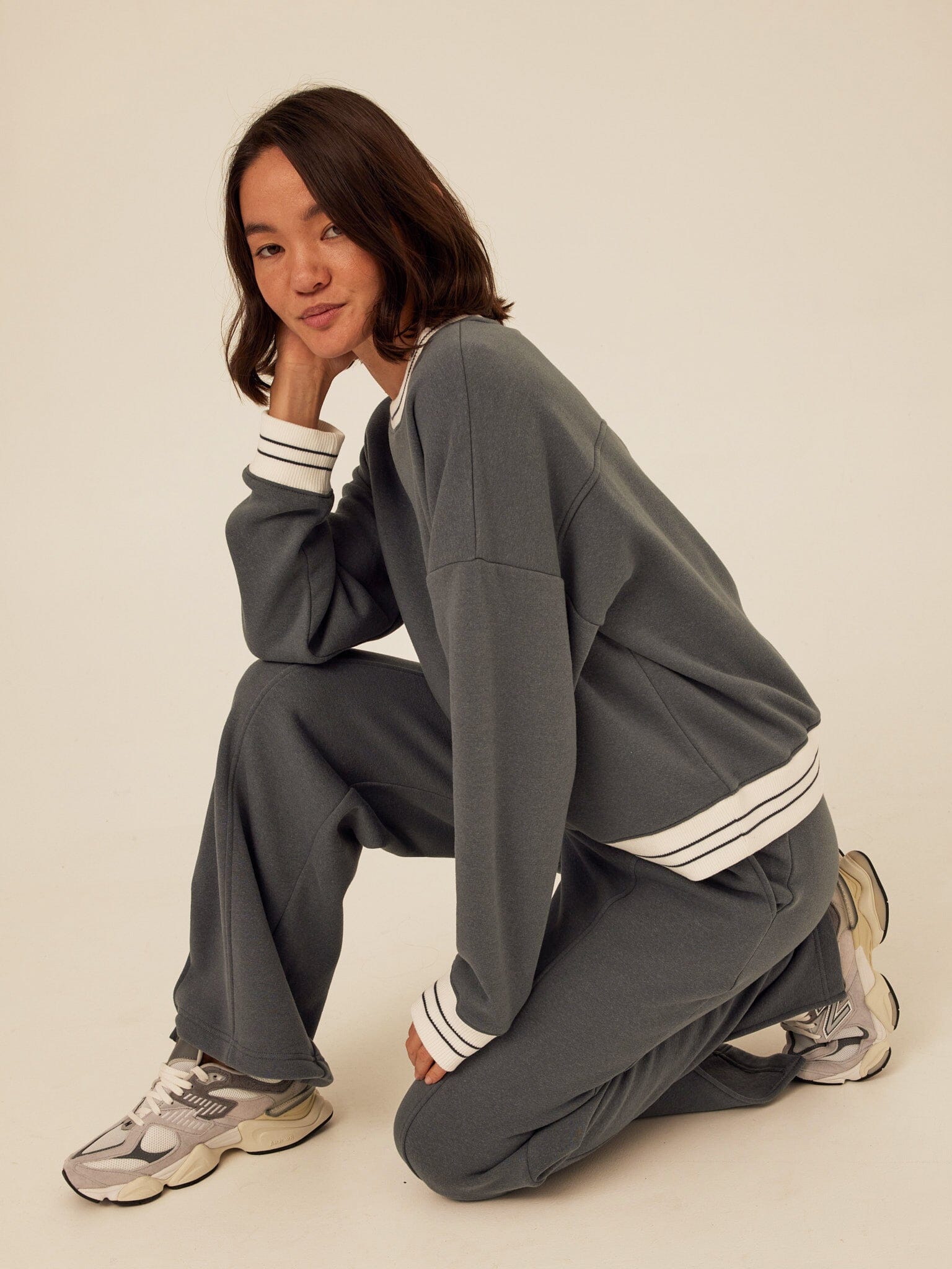Model wearing Bellona Triblend Fleece wide-leg pants in slate-blue with contrast waistband